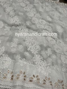 Beautiful Chikankari (famous hand embroidery style from Lucknow, City of Nawabs, India) on georgette saree with gota patti add ons. FALL ATTACHED AND PETTICOAT INCLUDED ! Includes hand embroidered blouse piece. Designer White Blouse Piece With Chikankari Embroidery, Anarkali Sets With Floral Embroidery In Lace, Festive Georgette Lehenga With Lace Work, Designer White Blouse Piece With Intricate Embroidery, Designer White Blouse With Intricate Embroidery, Festive Lace Sets With Floral Embroidery, White Lace Fitted Saree, Fitted Lace White Saree, White Fitted Lace Saree