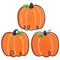 three orange pumpkins sitting on top of each other