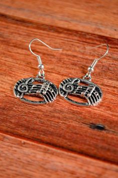 These music earrings make great nautical gifts or excellent stocking stuffers for this holiday season! These treble clef earrings also make great gifts for teens or for white elephant gifts! The music sheets are about an inch long, half an inch wide. These musician earrings hang about an inch from the earlobe. All metals are hypoallergenic. Have any questions? Please shoot me a message! Treble Clef Jewelry, Music Earrings, Galaxy Jewelry, Galaxy Earrings, Summer Rings, Druzy Jewelry, Music Jewelry, Nautical Gifts, Magical Gift