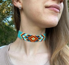 Turquoise choker with native ornament. Made from Czech beads. Length 12.3 inches (32 cm)+Chain extension 2 inches (5cm) Width 1 inches (2.5 cm)  >Back to my shop: https://www.etsy.com/shop/jewelrybylarisa?ref=seller-platform-mcnav Turquoise Choker With Colorful Beads, Traditional Turquoise Choker Jewelry, Bohemian Turquoise Choker With Tiny Beads, Adjustable Turquoise Choker With Tiny Beads, Adjustable Turquoise Beaded Choker, Bohemian Beaded Round Choker, Adjustable Round Choker For Festivals, Traditional Turquoise Jewelry With Tiny Beads, Southwestern Festival Choker With Round Beads