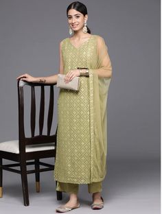 *Women Ethnic Motifs Embroidered Regular Sequinned Kurta with Trousers & With Dupatta Pakistani Salwar Kameez / Indian Wedding Dress / Plus Size Cotton Dress Traditional Indian Wear / Salwar Kameez Dupatta / Kurti Palazzo Set / Hand Embroidery kurta Olive green embroidered Kurta with Trousers with dupatta *Kurta design:-  *  Ethnic motifs embroidered   *  Straight shape   *  Regular style   *  V-neck, sleeveless no sleeves   *  2 pockets sequinned detail   *  Calf length length with straight hem Sleeveless Georgette Dress For Eid, Sleeveless Salwar Kameez For Party, Semi-stitched Sleeveless Dress With Dupatta, Unstitched Sleeveless Dress For Eid, Sleeveless Embroidered Dresses For Navratri, Sleeveless Embroidered Navratri Dress, Semi-stitched Sleeveless Dress With Chikankari Embroidery, Unstitched Sleeveless Salwar Kameez For Festive Occasions, Semi-stitched Sleeveless Dress For Diwali