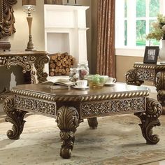 a living room filled with furniture and a fire place in front of a window on top of a rug