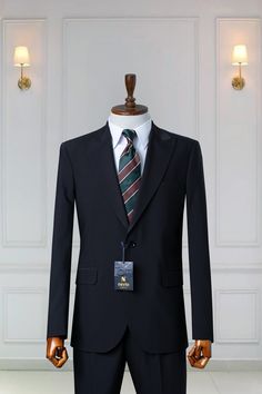 "*220's Woven Wool Men's Classic Suit *Fabric: 100%Wool Thick, Warm, Comfortable, Breathable, Softer, Wool Feeling *Center One Button Blazer With Pin Stitching and Zipper Fly Pants *Slim Fit, 9 Cm Peak Lapel, 5 Cm Flap Pocket  *Double Vent On The Behind Of The Jacket *This Suit Has A 6\" Drop Which Is The Difference Between The Size Of The Jacket & Pants. For Example, A 40r Jacket Includes A 34W Pant *Dry Clean Only *Available Eu Sizes: 48-50-52-54-56-58 *Available Us Sizes: 38-40-42-44-46-48 *I Classic Black Three-piece Suit With Long Sleeves, Black Three-piece Suit With Long Sleeves For Office, Custom Fit Business Three-piece Suit, Classic Black Sport Coat For Office, Black Long Sleeve Suit In Suiting Fabric, Black Long Sleeve Suit, Black Suits With Concealed Placket For Office, Black Office Suits With Concealed Placket, Black Men Suits