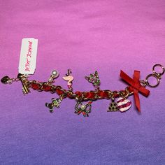 Nwt Betsey Johnson Holiday Charm Bracelet. Currently Retailing On Her Retail Sites For $68 Trendy Red Jewelry For Festive Occasions, Trendy Red Festive Jewelry, Adjustable Red Charm Bracelet For Party, Valentine's Day Multicolor Charm Bracelet, Handmade Red Metal Charm Bracelet, Red Charms Jewelry For Party, Red Metal Bracelets For Festive Occasions, Red Party Jewelry With Charms, Betsey Johnson Bracelet