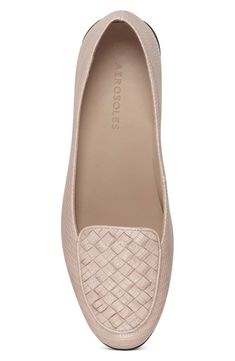 Inspired by an iconic Venetian loafer silhouette, the Brielle conveys an elegant, streamlined aesthetic. Woven embellishment complements the look with a refined textured effect. Stitch 'N Turn technology assures an endlessly flexible, comfortable fit. 3/4" Heel Height. Synthetic Upper, Balance Synthetic Materials.Sizing: True to size. M=standard width. - Apron toe- Slip-on - Lightly padded footbed- Approx. 0.75" heel- ImportedThis item cannot be shipped to Canada. Faux leather upper, manmade sol Chic Synthetic Slip-ons For Work, Elegant Slip-ons With Woven Sole And Round Toe, Chic Synthetic Flat Slip-ons, Office Slip-on Synthetic Loafers, Elegant Synthetic Slip-ons For Office, Synthetic Slip-on Loafers For Office, Modern Pointed Toe Synthetic Flats, Modern Synthetic Pointed Toe Flats, Synthetic Slip-on Office Loafers