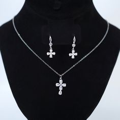 New to our Millennium collection, These beautiful romantic Clover and Cross Drop bridal earrings and necklace set are made of very fine quality of Swarovski crystals/ Cz diamonds, stainless steel and plated with platinum and gold for your special day! Even we have hard time taking pictures because of their shine 😄 so we want to shine our brides on their special days. Simulated diamonds are also known as diamond simulants and include things like cubic zirconia (CZ), moissanite, and YAG. They can Bridal Earrings Drop, Necklace Bridal, Earrings And Necklace, Cz Necklace, Jewelry Bridal, Diamond Simulant, Necklace Statement, Bride Jewellery, Cz Diamond