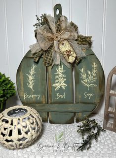 a wooden sleigh with some plants on it