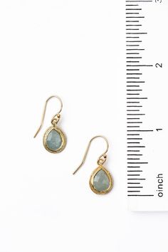 Handcrafted earrings are completed with gold filled ear wires for a polished look. Gold Filled (Lead & Nickel Free) Aquamarine 1" with gold filled ear wires We hand select our natural materials, thus there may be slight variations in color and/or size that will not detract from the overall aesthetic. Our unique handcrafted designer jewelry for women is made in America, each design created individually in our personal design studio in Floyd, VA USA 14k Gold Filled Teardrop Earrings For Gift, Gold Wire Wrapped Teardrop Earrings, Gold Wire-wrapped Teardrop Earrings, Hypoallergenic 14k Gold Filled Teardrop Earrings, Adjustable Gold Teardrop Earrings With Ear Wire, Adjustable Gold Teardrop Earrings, Teardrop Jewelry With French Hook For Gifts, Teardrop French Hook Jewelry For Gifts, Teardrop French Hook Jewelry As A Gift