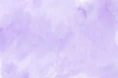 an abstract purple and white background with clouds