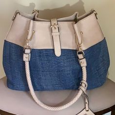 Nwot Denim Blue And Tan Braided Handles And Also A Shoulder Strap Snap Closure, Large Zip Pocket On Outside, Comes With Zippered Wristlet Blue Denim Shoulder Bag With Handles, Everyday Denim Shoulder Bag With Handles, Casual Denim Shoulder Bag With Leather Handles, Chic Denim Bag With Double Handle, Chic Denim Shoulder Bag With Double Handle, Chic Double Handle Denim Shoulder Bag, Denim Tote Hobo Bag, Denim Hobo Tote Bag, Casual Denim Blue Shoulder Bag With Leather Handles