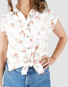 Get ready to turn heads in this oh-so-dapper Dylan floral shirt! This short sleeve button up with a classic collar and a front knot will have your wardrobe blooming with style. Featuring brass colored buttons and a fishtail hem, you get the choice of doing a half tuck or full tuck. Dress it up with your favorite skirt or keep it casual with jeans. Model is wearing a small 100% Rayon Imported Machine wash cold, with like colors No bleach Tumble dry low Low iron if needed Tuck Dress, Low Low, Front Tie Shirt, Low Iron, Short Sleeve Button Up, Brass Color, Floral Shirt, Dolman Sleeve, Shirts Tops