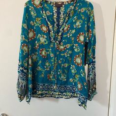 Beautiful Blouse - New, Never Worn - Long Sleeve Size Is Medium *Willing To Accept Reasonable Offers* Any Questions? Don’t Hesitate To Ask! Long Sleeve Turquoise Tops For Vacation, Long Sleeve Turquoise Blouse For Spring, Turquoise Long Sleeve Tops For Vacation, Turquoise Long Sleeve Top For Summer, Blue Tunic Top For Vacation, Blue Tunic Blouse For Vacation, Fitted Bohemian Blue Blouse, Blue Bohemian Long Sleeve Blouse, Blue Bohemian Tunic Top