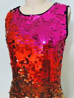 "Such a colorful dress! It's fully embellished with multi color sequins all over and in good vintage condition! Measurements: (note, the measurements range because there is some stretch in the fabric) Bust - 32-36\" Waist - 26-30\" Hips - 36-40\" Length - 34\" Tag Size - Small This dress comes from a pet-free and smoke-free home. If you would like more info or have any questions, please don't hesitate to ask!" Rainbow Sequin Dress, Iridescent Dress, Deco Dress, Art Deco Dress, Dress Art, Colorful Dress, Sequin Party, Sequined Dress, Rainbow Bright