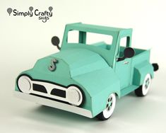 a paper model of a green truck on a white background with the words simply crafty written below it