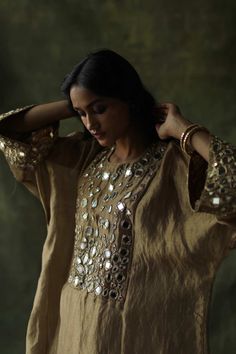 Begum Pret | Beige Sahiba Kaftan Set | INDIASPOPUP.COM Bollywood Style Kaftan With Gota Work For Party, Traditional Summer Kurta With Sequins, Traditional Sequined Summer Kurta, Embellished Palazzo Set For Navratri, Festive Zari Work Tunic Set, Traditional Sets With Mirror Work On Tunic, Eid Tunic With Mirror Work, Traditional Festive Embellished Tunic, Festive Traditional Embellished Tunic