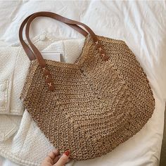 SPECIFICATIONSBrand Name: YIYUEQIANLIHandbags Type: Shoulder BagsTypes of bags: Shoulder & HandbagsMain Material: StrawLining Material: PolyesterShape: BucketPlace Of Origin: HE BEI ProvincePlace Of Origin: HE BEI ?ProvinceOrigin: Mainland ChinaCN: HubeiPattern Type: SolidInterior: Cell Phone PocketDecoration: NONEExterior: NONEOccasion: VersatileClosure Type: zipperGender: WOMENStyle: CasualNumber of Handles/Straps: twoChoice: yessemi_Choice: yes Casual Woven Hobo Bag In Pouch Shape, Casual Woven Hobo Pouch Bag, Summer Light Brown Bag For Vacation, Summer Style Light Brown Vacation Bag, Summer Vacation Light Brown Bag, Trendy Beach Hobo Bag With Leather Handles, Trendy Hobo Bag With Leather Handles For Beach, Light Brown Beach Bag With Adjustable Strap For Vacation, Bohemian Style Bags For Beach Season Shopping