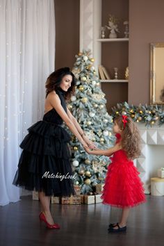 Mommy And Me Dresses For Wedding, Mother Daughter Matching Dresses, Photography Dress Mother daughter matching dresses in red and black color  Mommy`s outfit is midi length tutu dress with high collar and open back. Daughter`s dress is below knee length tutu red dress. Dresses can be tailored in different colors or color combinations, just contact me with your request. Fabric: Satin, tulle Length of the dress can be made as you wish. Any changes of the design of the dresses are possible Sizes Fo