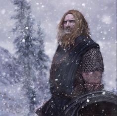 a man with long hair standing in the snow holding a shield and looking off into the distance