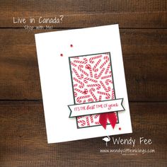 a handmade card with red and white paper