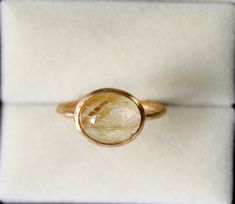 Handmade Golden Rutilated Quartz Ring - Dainty Rutilated Gold Ring - Genuine Rutilated Birthstone Ring - Gift for Her  9K,10K,14k,18K,22K Stone Size  - 8x10 MM  Width - 1.70 mm   Gold Colour Options -  Yellow Gold, White Gold, Rose Gold  Ready to Ship 1-2 week Available  White, Yellow, Rose Gold ( also in 9K, 10K, 14K, 18K, 22K ) Customization is available, I also can make it with 9k,10k,14k,18k,22k solid gold (white or rose), and diamond accent stone, just feel free to contact me. Any questions Heirloom-style Gold Crystal Ring As Gift, Handmade Elegant Yellow Gold Crystal Ring, Handmade Heirloom Gold Crystal Ring, Rutile Quartz Ring, Rutile Quartz Jewelry, Flower Pressing, Handmade Wedding Rings, Rutilated Quartz Ring, Golden Rutilated Quartz