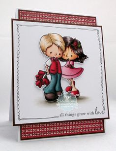 a handmade card with two children kissing and the words, all things grow with love