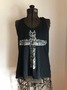 Vintage Ralph Lauren Tribal Shirt Distressed styling Totem pole Graphic  Black and white  tank  top Racer back style tank style T shirt Cowhichan inspired  Workwear  100% Cotton Ralph Lauren Denim and Supply  Size woman's small Approximate measurements in inches: pit to pit: 34 26 down center back length from shoulder to bottom hem: 23.25 Sleeve 25.50 Grunge Tank T-shirt For Summer, Summer Grunge Tank T-shirt, Graphic Print Tank Tops For Festivals, Festival Graphic Print Tank Tops, Bohemian Graphic Print Tops For Streetwear, Summer Punk Style Vest Top, Bohemian Streetwear Tops For Summer, Summer Grunge Tops With Back Print, Edgy Racerback Top For Streetwear