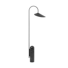 a black floor lamp on a white background with the light turned off and dimmed