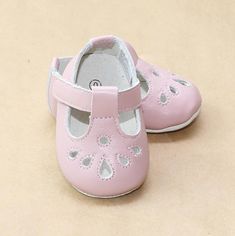 Beautiful buttery soft leather pre-walker t-bar mary jane shoes, made with velcro fastening. These shoes have a flexible suede leather outer sole -- and the prettiest tear drop perforated cut out pattern on the front for the tiniest toes. Infant sizes 0-5. Size Chart (in-sock length, measured from inside): Size 0 1 2 3 4 5 In. 3.74 4.09 4.41 4.76 5.08 5.39 Mary Jane Shoe, Angel Baby, Jane Shoes, Baby Angel, Mary Jane Shoes, T Strap, Tear Drop, Suede Leather, Mary Janes