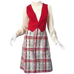 Chic mid 1960s PAT SANDLER red, white (ivory) and blue trompe l'oeil long Sleeve A-Line dress! Features a high necked ivory crepe bodice with a mock vest sewn into the dress to look like the dress is layered, when it is actually one piece. Soft wool plaid skirt gives this gem a nautical feel. Skirt is fully lined. Full metal zipper up the back with hook-and-eye closures. In great condition. Made in USA Approximately Current Size Medium Measurements: 36-38 inch bust 30-31 inch waist 42-44 inch hi 70s Inspired Fashion, Cocktail Dress Vintage, Designer Evening Dresses, Poses References, Karate Kid, 1960s Fashion, Line Dress, 60s Fashion, Blue Vintage