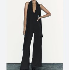 Halter Neck Jumper By Zara. Multi Way Tied Detail On The Neck. Open Beck. Zipper On The Back. Wide Leg. Dressy. Looks Great!! New # 9821 707 800 Zara Sleeveless Jumpsuits For Evening, Zara Black Jumpsuits And Rompers For Evening, Zara Sleeveless Evening Jumpsuits And Rompers, Zara Black V-neck Jumpsuit, Zara Black Formal Jumpsuits And Rompers, Black V-neck Jumpsuit From Zara, Elegant Zara Jumpsuits And Rompers, Sleeveless Evening Jumpsuits And Rompers By Zara, Zara Stretch Jumpsuits And Rompers For Party