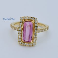 Thank you for coming in! 14k solid yellow gold ring with a beautiful 1.61CT pink imperial topaz and 0.39Ct diamond accent!  Photos were taken under different lightings, you will receive the ring in the photos! WEIGHT: 3.43 grams (1.61ct topaz, 0.39ct diamond) DIMENSION: 9.6mmx15mm top (5mmx10.5mm topaz) MATERIAL: 14k solid yellow gold, Imperial Topaz, diamond Gold Rings With Diamond Accents And Pink Sapphire, Yellow Gold Pink Sapphire Jewelry With Halo Setting, Yellow Gold Pink Sapphire Diamond Ring With Accent Stones, Anniversary Pink Sapphire Diamond Ring In Yellow Gold, Anniversary Yellow Gold Diamond Ring With Pink Sapphire, Gia Certified Gold Topaz Ring, Gia Certified Yellow Gold Topaz Ring, Gia Certified Yellow Gold Topaz Ring As Gift, Gold Jewelry With Pink Sapphire In Halo Setting