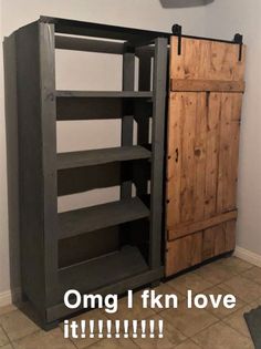 a wooden cabinet sitting in the corner of a room