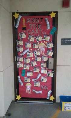 a door decorated with movie themed items and the words meet the cast written on it