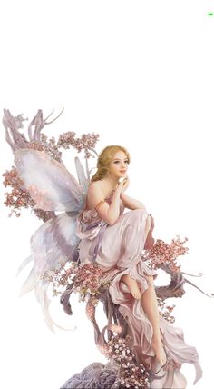 a figurine of a fairy sitting on top of a tree branch with flowers