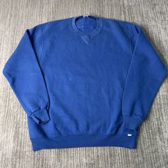 Vintage 80s Russell Athletic Basic Blank Made in USA Streetwear 1980s Fashion Blue Pullover Crewneck Large Mens Condition:  Excellent Used Condition  = No Flaws Measurements: Please see photos above for all measurements IF YOU BUY TWO OR MORE ITEMS USE THE CODE BUNDLE @ CHECK TO SAVE 20% WE SHIP WITHIN 24 HOURS AFTER PURCHASE! Please be aware that we do not offer free returns!! The Buyer is responsible for the cost of the return label. Follow us on TikTok & Instagram @findsnostalgic and tag us in your finds Blue Pullover, 1980s Fashion, Russell Athletic, Saint Paul, Made In Usa, Adult Outfits, Street Wear, Crew Neck, Sweatshirts