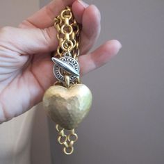 Hammered Puffy Toggle Heart Chain Link Statement LOVE Necklace. Designer Quality, Two- Tone Silver & Gold Tone Plated, Quality Costume Fashion Jewelry Necklace, very good condition. Length: 21 IN approx, neck loop  With 2 IN Length hanging ring and heart pendant  Heart: 34.5 MM or 1 3/8 IN  Toggle Closure  Chunky Chain, brushed gold tone or matte finish  Nice quality weight. 57.8 grams   Silver and gold plated  Nice costume jewelry  Vintage, gently worn, if worn, contemporary  Unsigned, attributed, original retail is $175. Heart Chain, Love Necklace, Fashion Jewelry Necklaces, Chain Link, Costume Jewelry, Heart Pendant, Silver Gold, Favorite Jewelry, Necklace Etsy