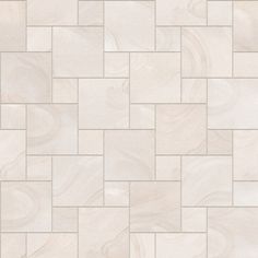 a tile floor with white and beige colors