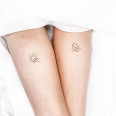 two sun and moon tattoos on both legs, one is sitting under the coverseat