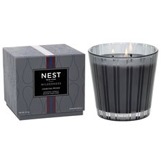 a candle that is next to a box