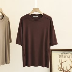 Spring/Summer Casual Solid Color Plus Size T-Shirt  Material: Cotton  Style: Plus Size T-Shirt Size: XL, 2XL, 3XL,4XL Color: Black, White, Coffee, Brown, Khaki  Occasion: Outdoor, Daily,  Vacation Oversized Solid Color T-shirt For Summer, Oversized Brown Summer Tops, Plain Brown Summer Tops, Casual Brown Summer T-shirt, Casual Brown T-shirt For Summer, Casual Brown Half Sleeve Top, Brown Crew Neck Top For Summer, Brown Short Sleeve T-shirt For Summer, Oversized Brown T-shirt For Summer