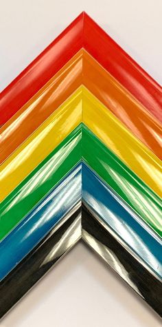 a close up of a multicolored triangle shaped object