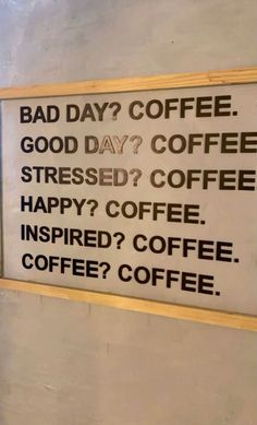 a sign that says bad day? coffee good day? coffee stressed? coffee happy? coffee inspired? coffee