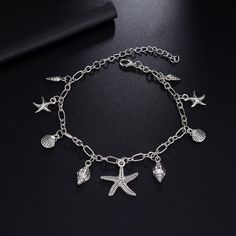 Entice Your Style with Elegance and Charm Step into summer with flair and a touch of ocean-inspired beauty with our Bohemian Starfish Pendant Anklet. Designed to accentuate your ankles with an eye-catching sparkle, this trendy anklet is perfect for beach days, casual outings, and special summer nights out. Crafted with meticulous attention to detail, this piece is not just jewelry; it's a statement of style and personality. Product Features This exquisite anklet is crafted from high-quality zinc Leg Jewelry, Starfish Anklets, Anklets For Women, Summer Anklets, Beach Anklets, Starfish Pendant, Anklet Bracelet, Anklet Jewelry, Shell Pendant