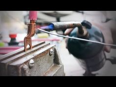 an electric device being worked on by someone