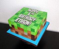 a birthday cake that is made to look like a minecraft block with the words happy 6th birthday finn on it