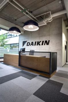 the daikin office is clean and ready for customers to use it's reception desk