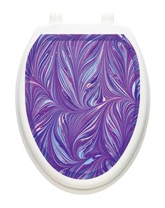 a toilet seat with purple and blue swirls on the back side, in front of a white background