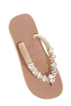 "Make a statement with these customized flip flops from Havaianas. Perfect for the beach or any casual occasion, these handmade sandals are designed for women who want to add a personal touch to their footwear. Each pair is carefully crafted with the finest materials to ensure maximum comfort and durability.  The unique features of these flip flops make them stand out from other women's shoes. They are perfect for those who want to express their individuality and style. Order your personalized H Bling Flip Flops, Bridal Flip Flops, Designer Flip Flops, Personalized Flip Flops, Diy Slippers, Jeweled Sandals, Handmade Sandals, Bling Shoes, Shoe Art