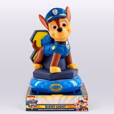 a toy that is sitting on top of a box with a paw patrol figure in it