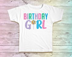 These birthday party shirts will make an excellent addition to your special party! Share the moment with your child while you both look incredible! #Women order size down on the unisex raglans! HOW TO ORDER: +Leave Note personalization section in listing For CHILD Shirts Front Only: +Date Needed By For back of shirt +NAME +AGE +DATE NEEDED By For FAMILY Shirts +NAME (Daddy, Mommy, Grandma, Sister, Brother, Nana, etc) +Date Needed Shipping and Delivery Times 3-5 days to Create your shirt. 3-5 Day Playful White Top For Birthday, Sweet White Top For Birthday, Sweet White Tops For Birthday, Fun Personalized T-shirt For Birthday, Sweet White T-shirt For First Birthday, Fun White Tops For Birthday Gift, Treats Birthday, Lollipop Birthday, Birthday Party Shirts